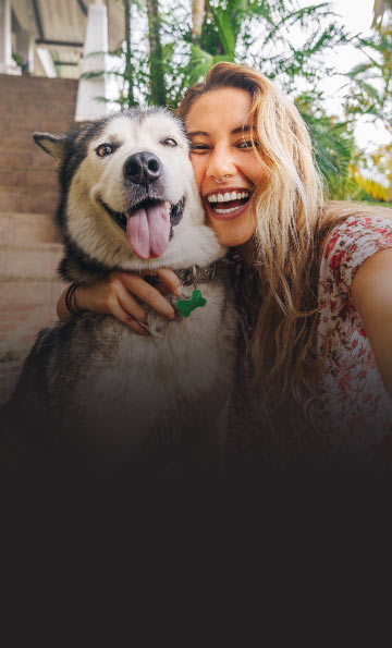women and dog laughing